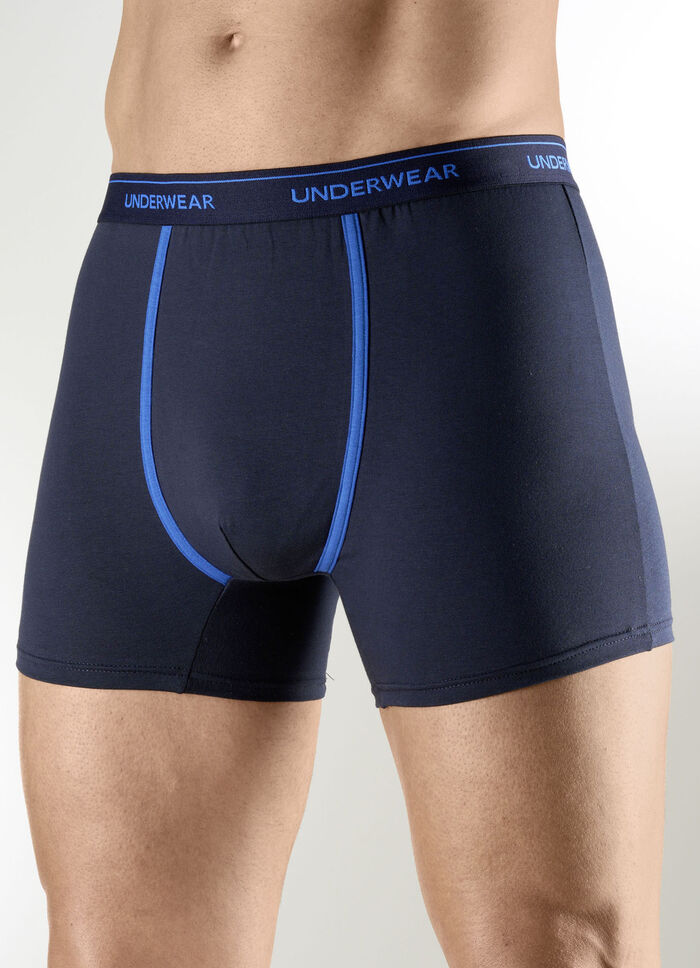 Fyrapack byxor med kontrasterande passpoaler 