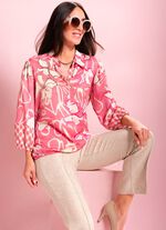 Blus med kn&auml;ppning 