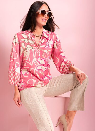 Blus med kn&auml;ppning 