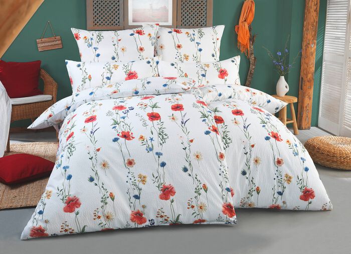 S&auml;ngkl&auml;der set tryckt p&aring; b&aring;da sidor 