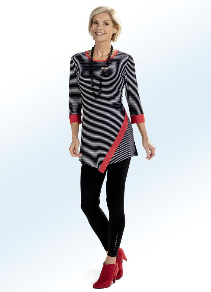 Leggings med elegant, gl&auml;nsande dekorativt motiv 