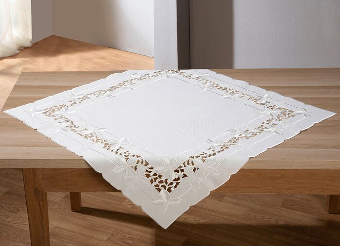 Bord- och rumsdekoration med utarbetade broderier 