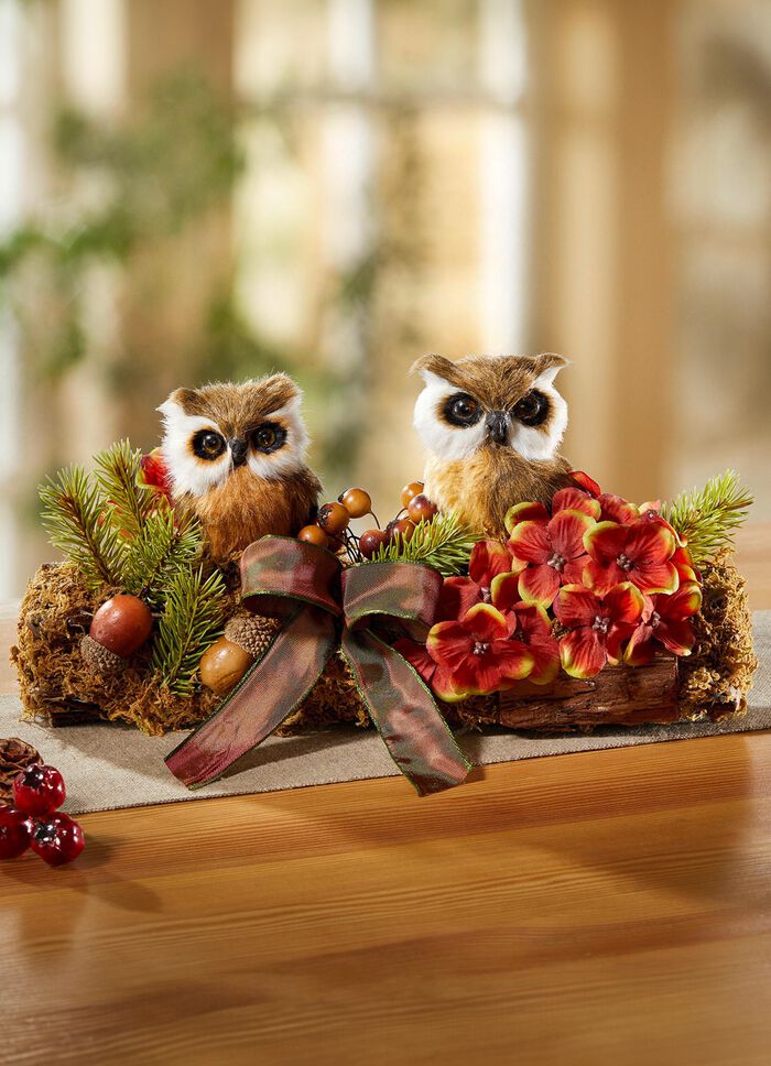 Bordsarrangemang med ugglor 