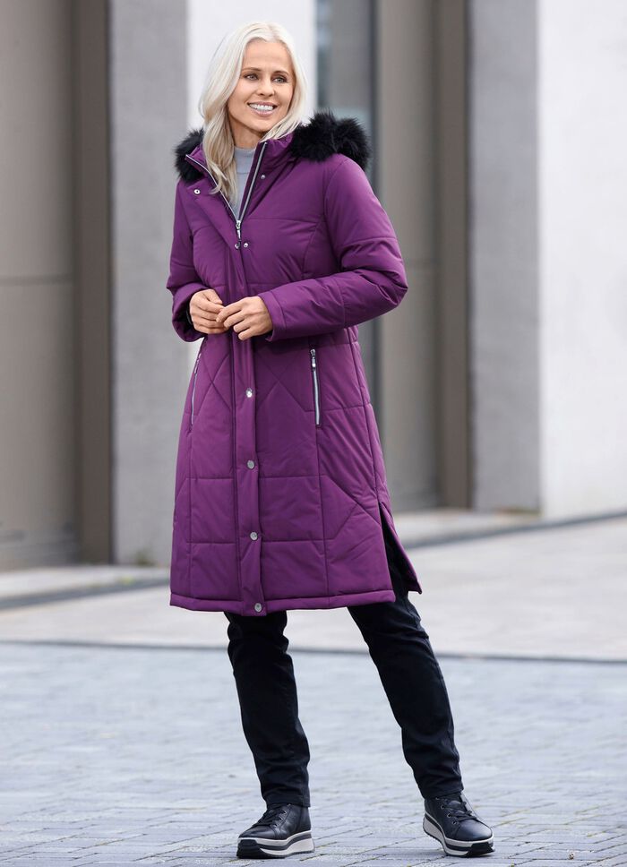 Kappa med dragkedja i sidorna 