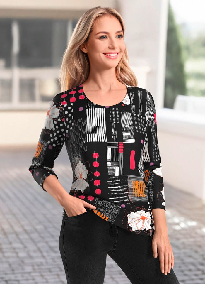 Skjorta med en livfull design &ouml;ver hela 