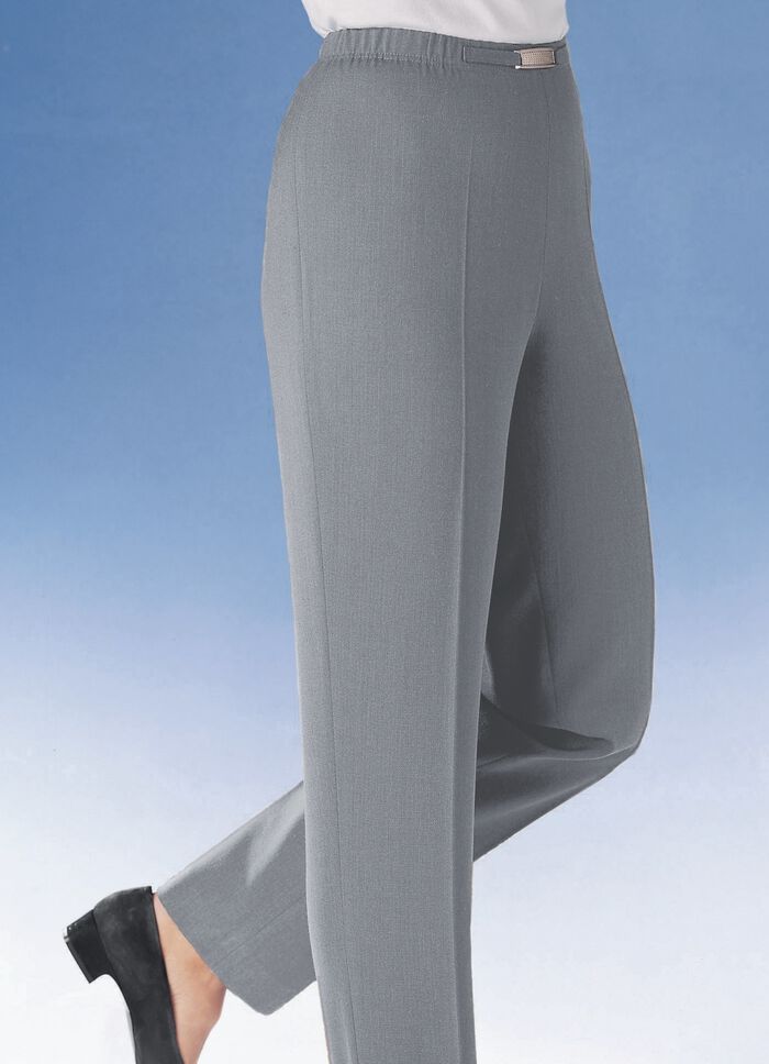 Byxor med metallbeslag vid midjan 