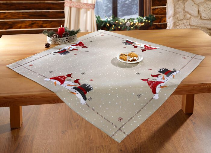 Magisk bords- och rumsdekoration med sn&ouml;gubbemotiv 