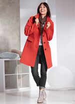 Kort kappa med s&ouml;mfickor 