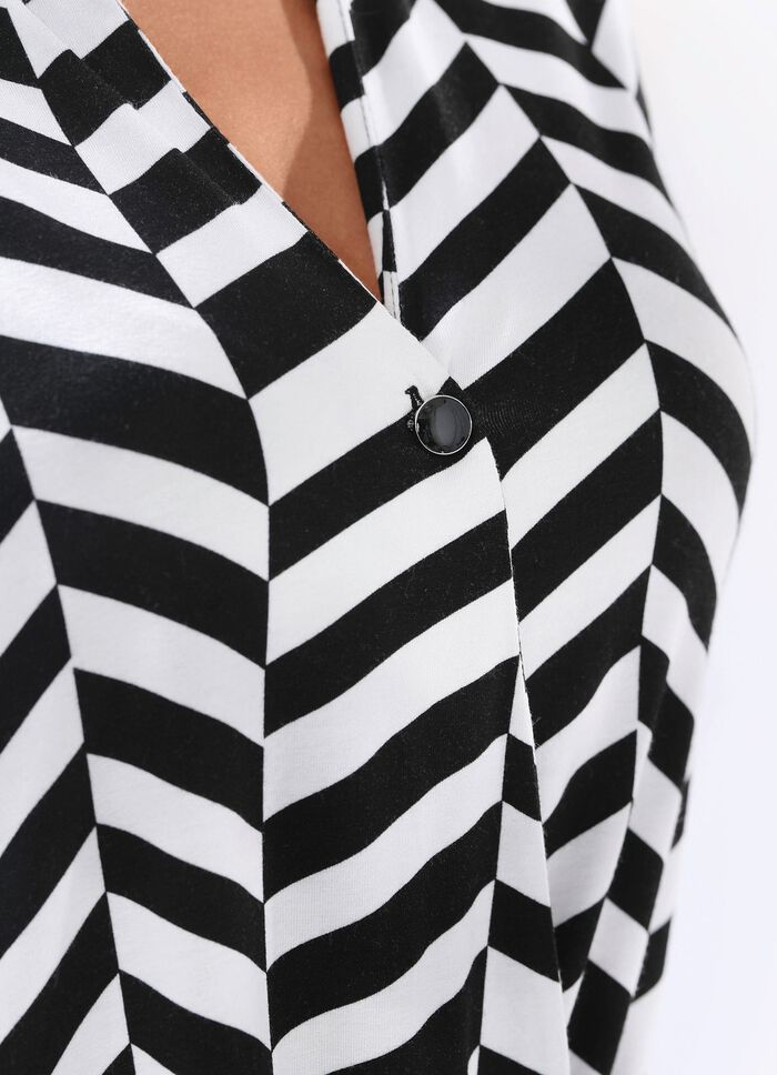 Fascinerande pik&eacute;tr&ouml;ja med omlott utseende 