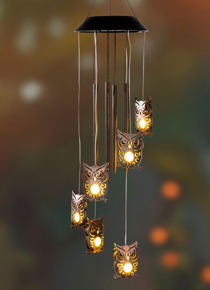 Solvindklocka med ugglor 