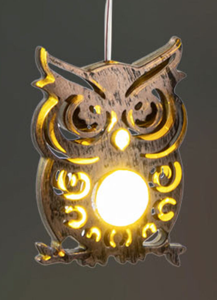 Solvindklocka med ugglor 