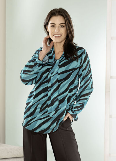 Blus med knytband i halsringningen 