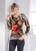 Skjorta med dekorativ ring i halsringningen 