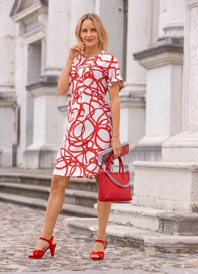 Kl&auml;nning med briljant f&auml;rgat tryck 