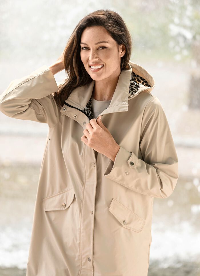 L&auml;tt A-linjeformad kappa 