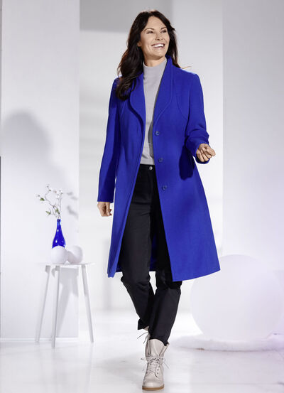 Kappa med elegant dold knappslå  Kappa med elegant dold knappslå