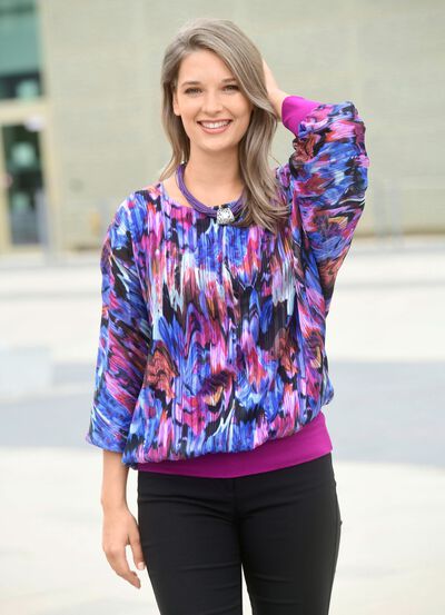 Ponchotunika med integrerad topp 