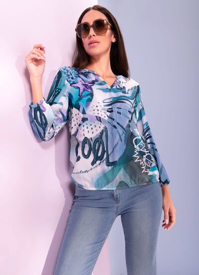 Blus med i&ouml;gonfallande m&ouml;nster 