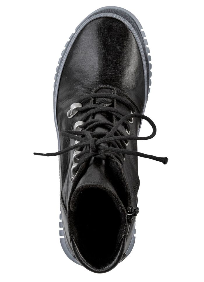 Tvillingskosko med sn&ouml;rning av mjukt nappal&auml;der 