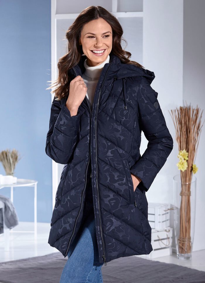 Funktionell l&aring;ng jacka med dekorativ fantasidesign 