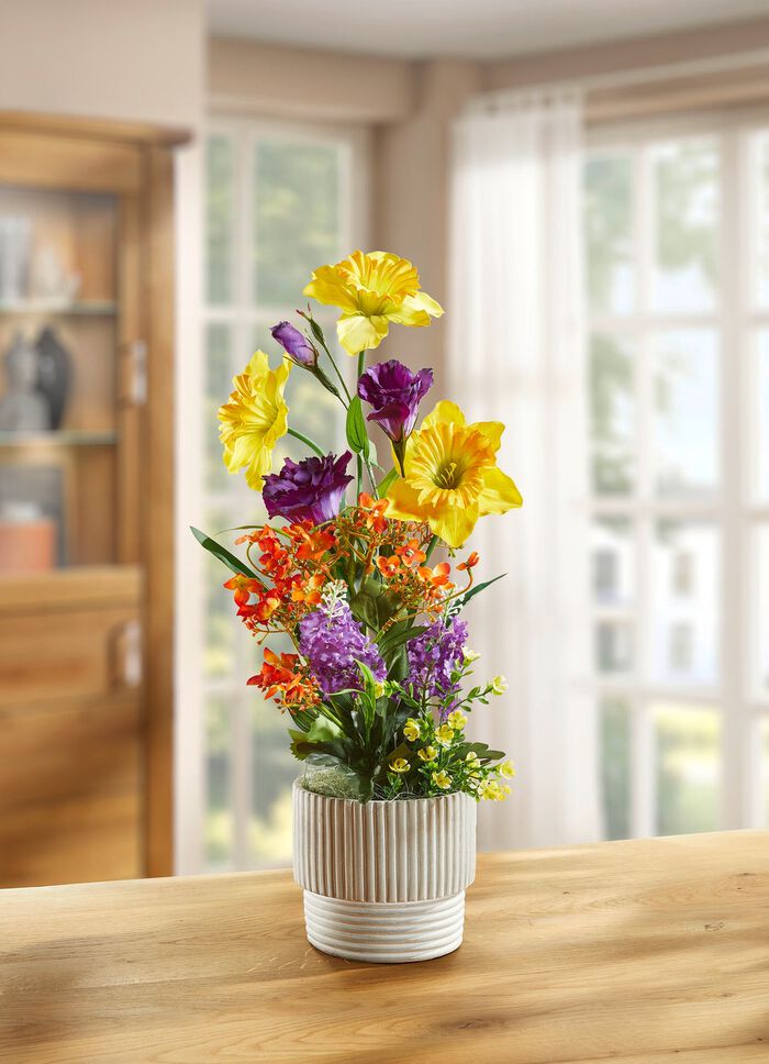 Blomsterarrangemang i kruka 