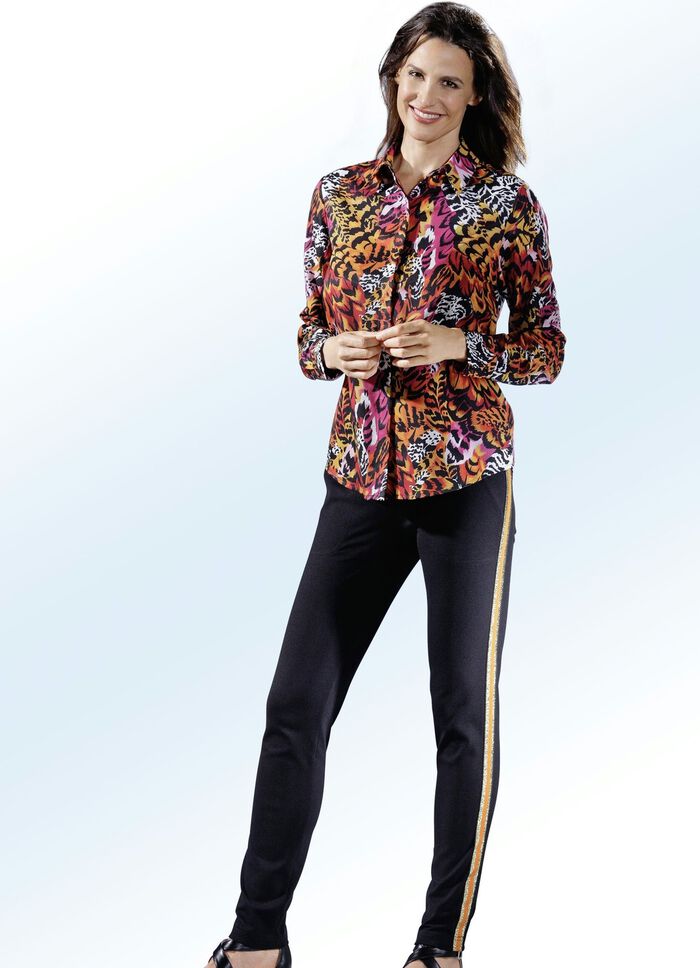 Snygg blus med l&aring;nga muddar 