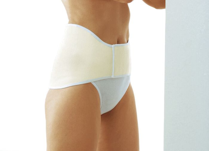 Ryggv&auml;rmare med kardborrekn&auml;ppning 