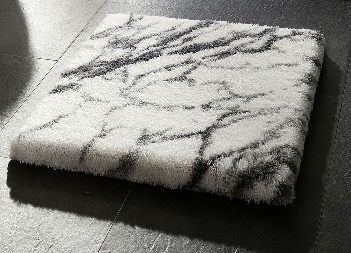 Badrumsset från Grund med marmordesign VIT