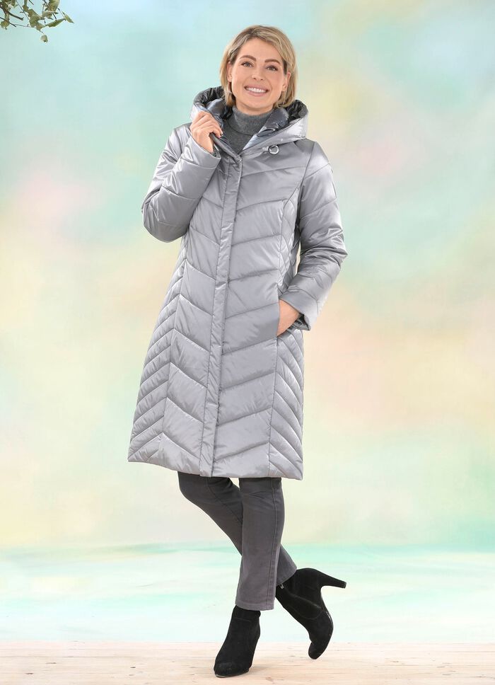 Kappa med p&aring;satt huva 