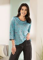 Skjorta med silverf&auml;rgade dekorativa tallrikar 