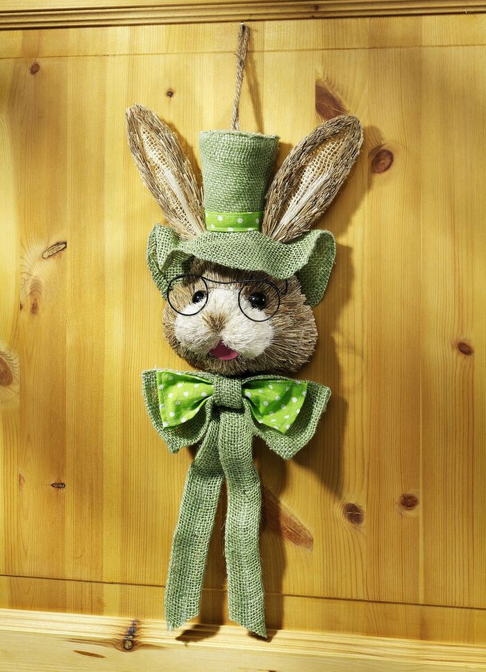 Kaninhuvud av finskurna naturfibrer 