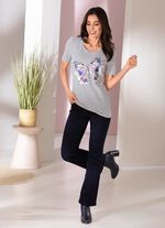 skjorta med dekorativt fj&auml;rilstryck 