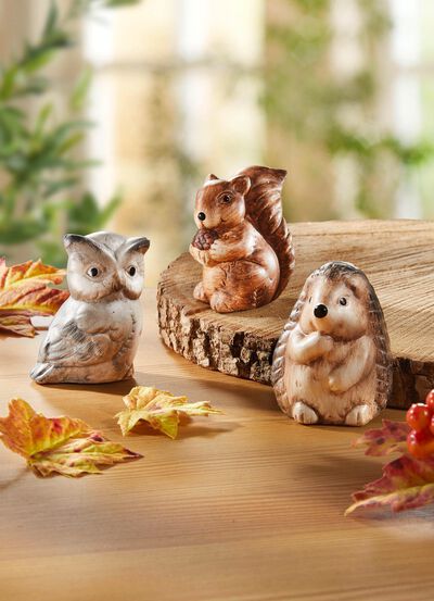 Keramiska h&ouml;stfigurer i ett set om 3 