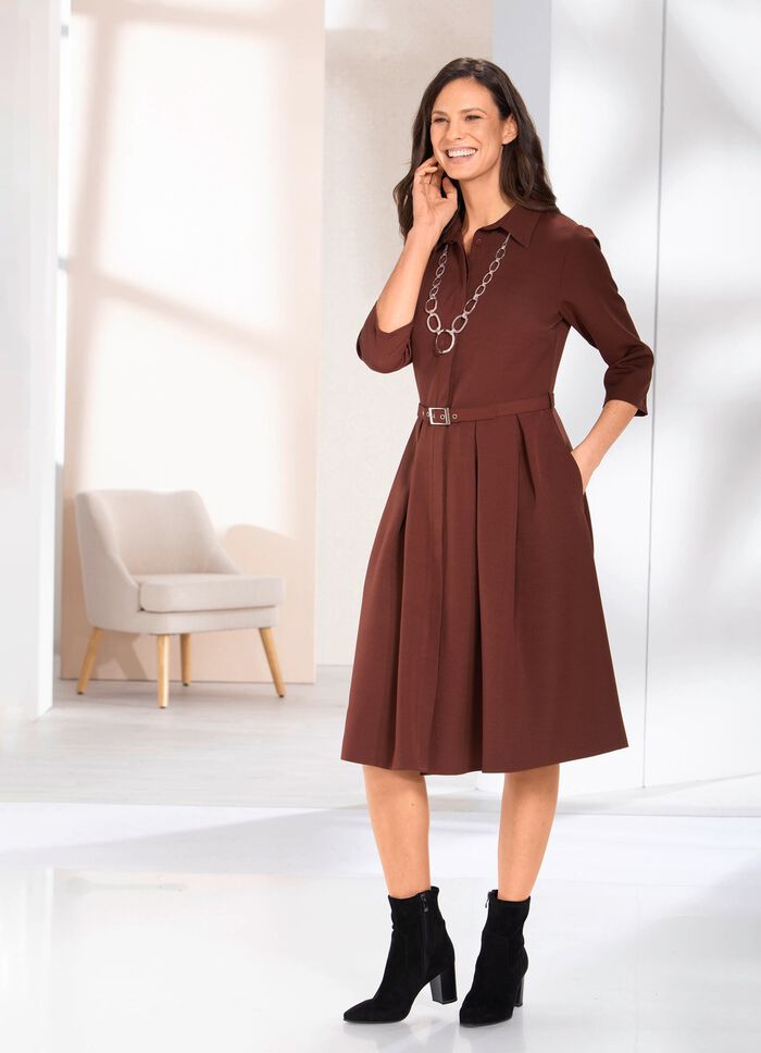 Kl&auml;nning med sk&auml;rp 