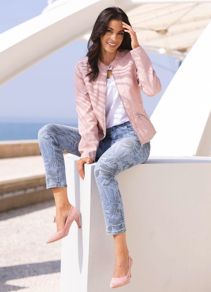 Jeans med blommigt helt&auml;ckande tryck 