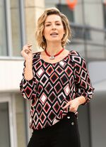 Tunika med f&auml;rgstarkt tryck 