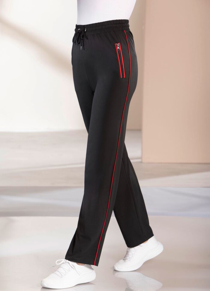 Avslappnade byxor med kontrasterande passpoaler 