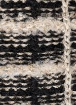 Kofta tillverkad av h&ouml;gkvalitativt effektgarn 