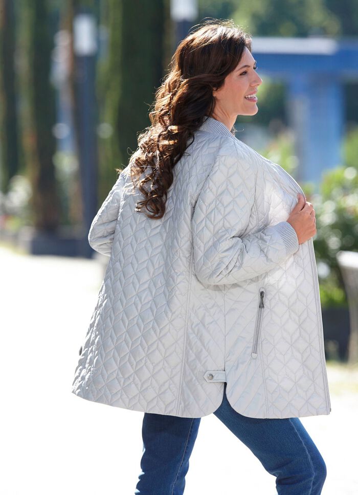 Jacka med intressant quiltning LJUSGR&Aring;