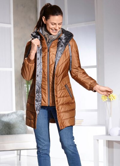 Kort kappa med v&auml;stinl&auml;gg 