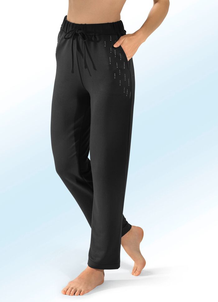 Byxor med nitar SVART