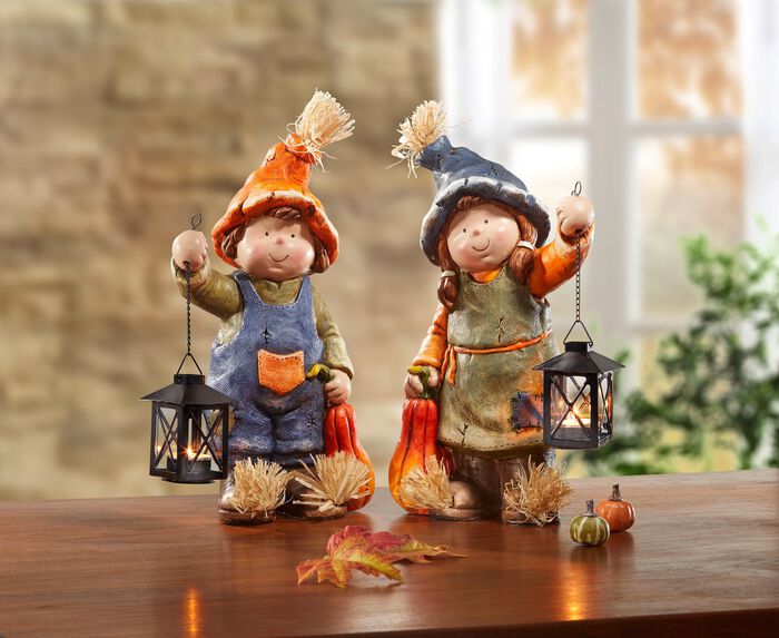 H&ouml;stbarn med pumpa och lykta 