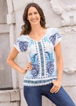 Skjorta med silverf&auml;rgade dekorativa tallrikar 