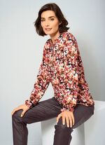 Slip-on blus med blomm&ouml;nster 