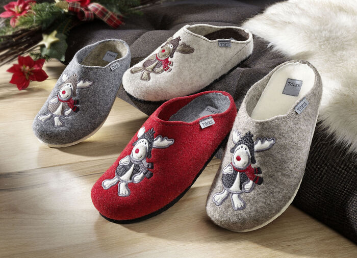 Fluffiga, varma tofflor av ullfilt 