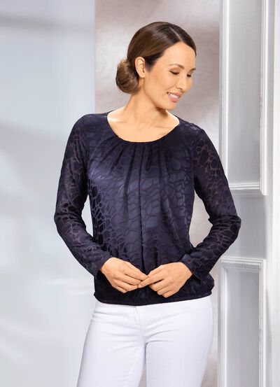 Tunika med vackra veck 