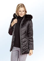 Jacka med kontrasterande dekorativ quiltning 