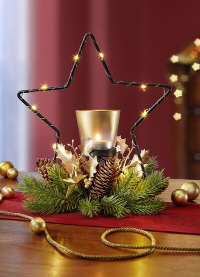 Dekorerad v&auml;rmeljush&aring;llare i metall med LED-belysning 