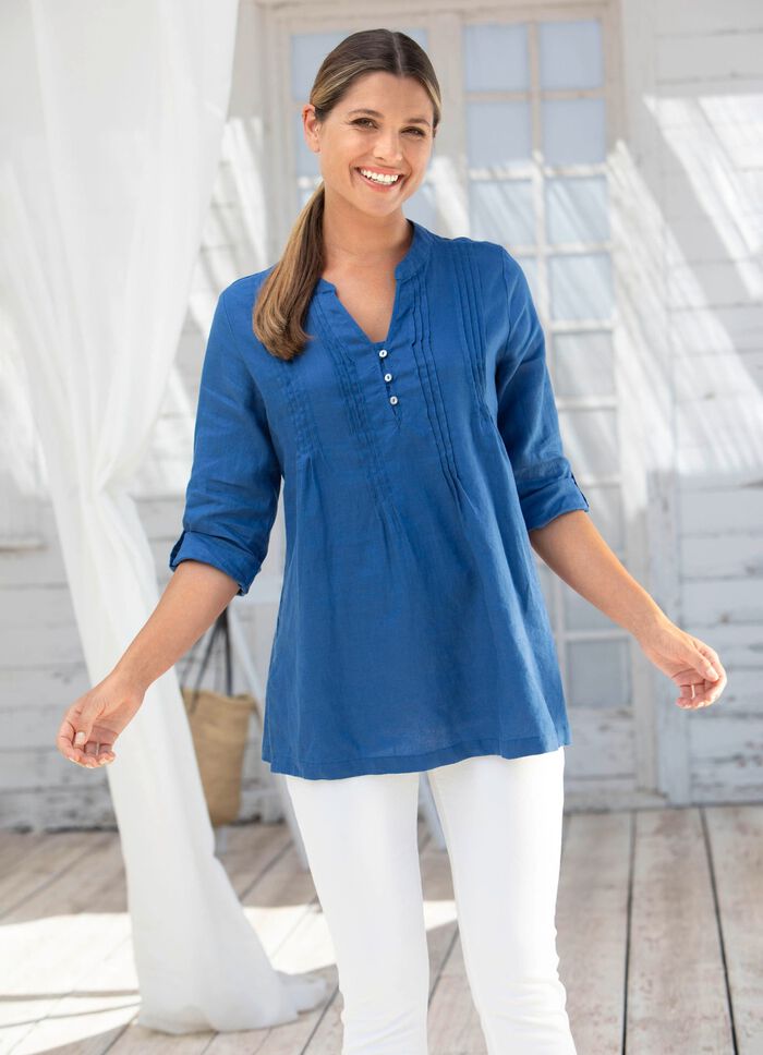 Tunika med dekorativa knappar 