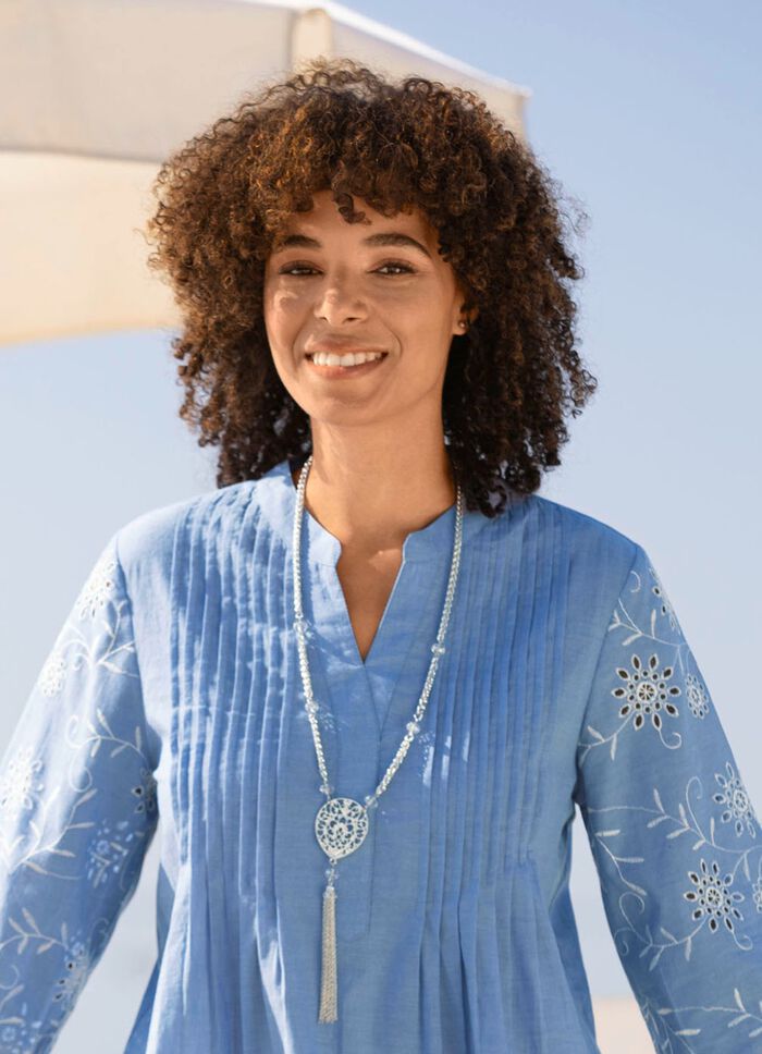 Halsband med h&auml;nge och tofs 